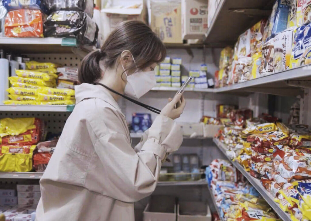 visually impaired women scanning supermarket products with dot go app